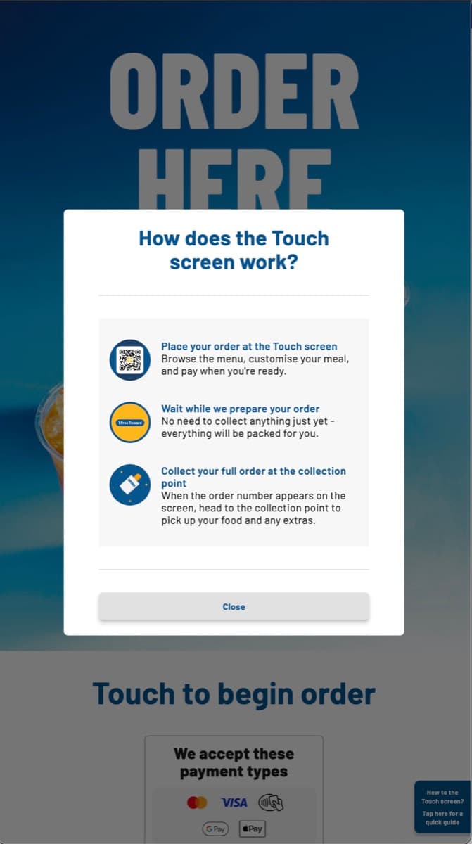 Modal titled 'How does the Touch screen work?' explaining the order, wait and collect steps