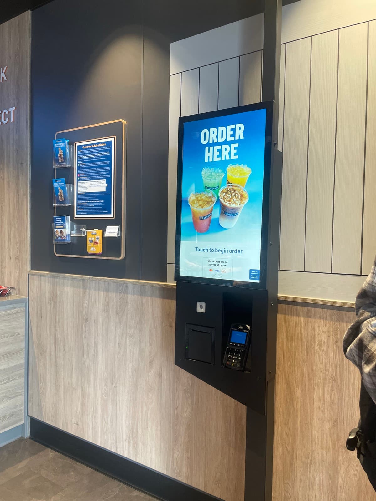 A Greggs self-service kiosk unit installed in a shop